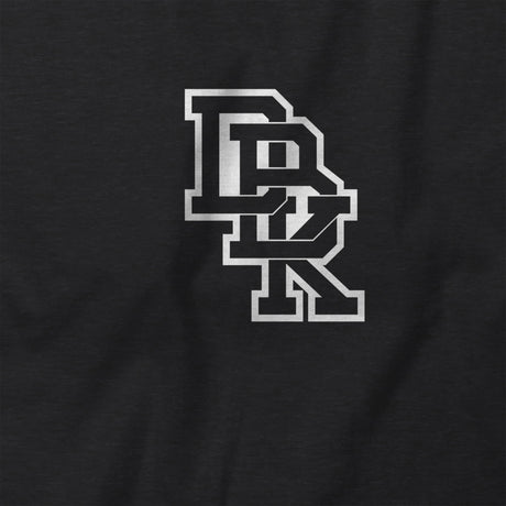 Hoodie chest logo close-up with stylized DRK letters