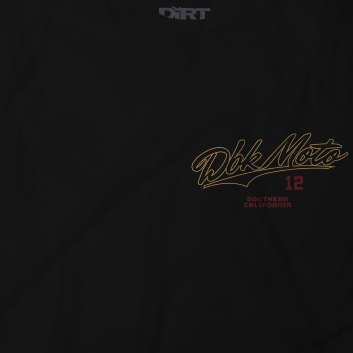 Slugger T-shirt logo close-up: Dbk Moto script with “12” and Southern California