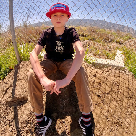 Youth black premium tee with front “Dirt Bikes Kidz” logo