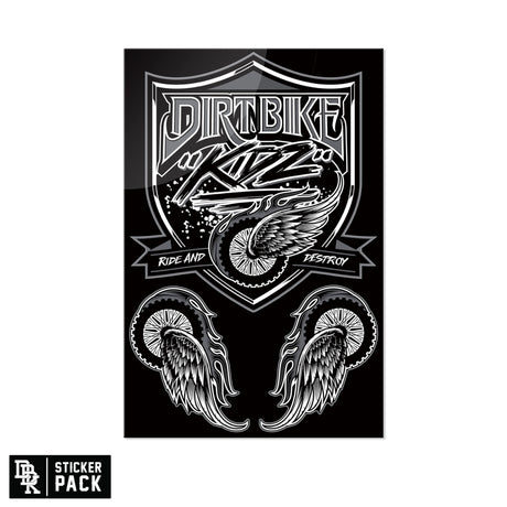 Sticker pack sheet with black shield graphic, winged wheel decals, and dirt bike lettering