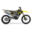 Yellow and black dirt bike with graphic kit, side view of panels and rear fender