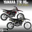 Yamaha TTR 110 faded motorcycle graphics kit in black with yellow and red accents
