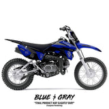 Yamaha TTR 110 Twitch Edition dirt bike, blue and gray graphics, front three-quarter view